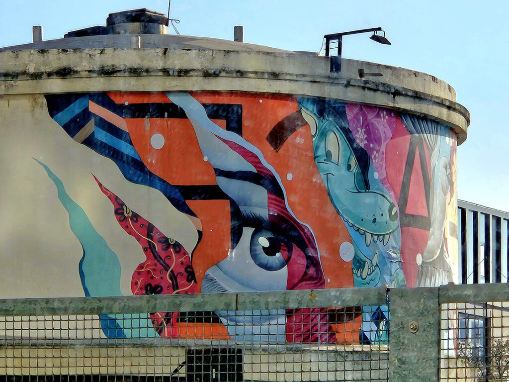 Best Paris Street Art, Best Street Art in Paris, Graffiti in Paris, Paris Street Art Tour, Paris Graffiti Tour, 13th Arrondissement Murals, Le Marais Street Art, Belleville Street Art, Montmartre Street Art, Batignolles Street Art, Rue Denoyez, Spot 13 Paris, LavoMatik Paris, Paris Graffiti Guide, Paris Graffiti Map, Street Art Map of Paris, Where is the Street Art in Paris, Banksy in Paris, Street Artists in Paris, Tunnel des Tuileries, Tuileries Graffiti Tunnel, Canal Saint-Denis Street Art, Paris Attractions, Free Graffiti Tour Paris, Top Street Art Spots in Paris, Iconic Paris Graffiti Locations, Urban Art Paris, Famous Graffiti Artists Paris, Paris Art Tours, Belleville Street Art Scene, East Paris Street Art, Hidden Gems Paris Art, Public Art Paris, Best Murals Paris, Paris Art Landmarks, Local Street Art Paris, Contemporary Graffiti Paris, Self-Guided Graffiti Tour Paris, Vitry-sur-Seine Street Art.